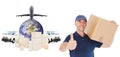 Composite image of happy delivery man holding cardboard box showing thumbs up