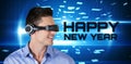 Composite image of happy handsome man with virtual reality simulator