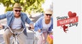 Composite image of happy mature couple going for a bike ride in the city Royalty Free Stock Photo