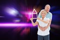 Composite image of happy older couple holding house shape