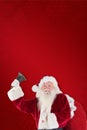 Composite image of happy santa ringing a bell
