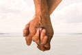 Composite image of happy senior couple holding hands Royalty Free Stock Photo