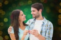 Composite image of happy young couple holding new house key Royalty Free Stock Photo