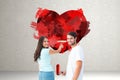 Composite image of happy young couple painting together Royalty Free Stock Photo