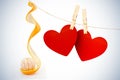 Composite image of hearts hanging on line Royalty Free Stock Photo