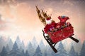 Composite image of high angle view of santa claus riding on sled during christmas