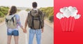 Composite image of hiking couple standing on countryside road