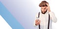 Composite image of hipster looking in mobile phonewhile holding Royalty Free Stock Photo