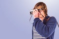 Composite image of hipster taking pictures with an old camera Royalty Free Stock Photo