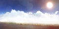 Composite image of idyllic view of sun over clouds during sunny day Royalty Free Stock Photo