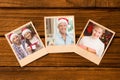 Composite image of instant photos on wooden floor Royalty Free Stock Photo