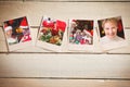 Composite image of instant photos on wooden floor Royalty Free Stock Photo