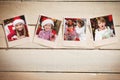 Composite image of instant photos on wooden floor Royalty Free Stock Photo