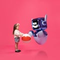 Composite image of interacting with 3D model of robot, playing with toy ball. Playful interaction and early tech Royalty Free Stock Photo