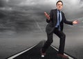 Composite image of irritated caucasian man against road and thunderstorm in dark sky