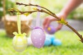 Composite image of little girl collecting easter eggs