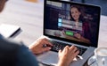 Composite image of login screen with dark-haired woman with coffee and laptop