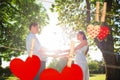 Composite image of loving young couple holding hands at park