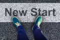 Composite image of man with canvas shoes on hardwood floor Royalty Free Stock Photo