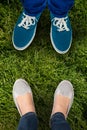 Composite image of man with canvas shoes on hardwood floor Royalty Free Stock Photo