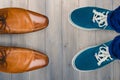 Composite image of man with canvas shoes on hardwood floor Royalty Free Stock Photo