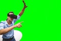 Composite image of man pointing while wearing virtual reality simulator Royalty Free Stock Photo
