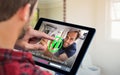 Composite image of man using tablet on wooden table Royalty Free Stock Photo