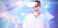 Composite image of man using virtual reality headset Royalty Free Stock Photo
