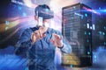 Composite image of man using virtual reality headset 3d Royalty Free Stock Photo