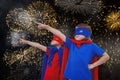 Composite image of masked kids pretending to be superheroes