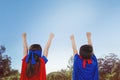 Composite image of masked kids pretending to be superheroes Royalty Free Stock Photo