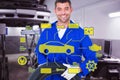 Composite image of mechanic holding tire on white background Royalty Free Stock Photo
