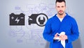 Composite image of mechanic wiping hands with cloth Royalty Free Stock Photo