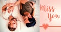 Composite image of men couple on bed and valentines words Royalty Free Stock Photo