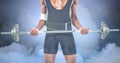 Composite image of mid-section of bodybuilder lifting heavy barbell weights Royalty Free Stock Photo