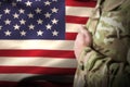 Composite image of mid section of military soldier taking oath Royalty Free Stock Photo
