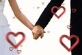 Composite image of mid section of newlywed couple holding hands in park