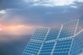 Composite image of modern solar equipment against grey sky Royalty Free Stock Photo
