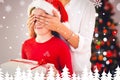 Composite image of mother surprising her daughter with christmas gift