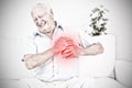 Composite image of old man suffering with heart pain