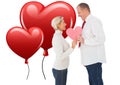 Composite image of older affectionate couple holding pink heart shape