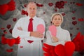Composite image of older couple standing holding broken pink heart