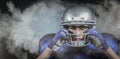 Composite image of portrait of american football player wearing helmet Royalty Free Stock Photo