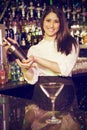 Composite image of portrait of bartender mixing cocktail drink in cocktail shaker Royalty Free Stock Photo