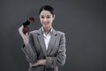 Composite image of portrait of a businesswoman holding binoculars Royalty Free Stock Photo