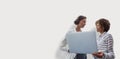 Composite image of portrait of businesswomen posing with laptop