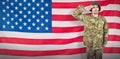 Composite image of portrait of confident soldier giving salute Royalty Free Stock Photo