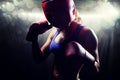 Composite image of portrait of female fighter with fighting stance Royalty Free Stock Photo