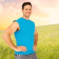 Composite image of portrait of a fit smiling young man Royalty Free Stock Photo