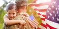 Composite image of portrait of girl hugging army officer father Royalty Free Stock Photo